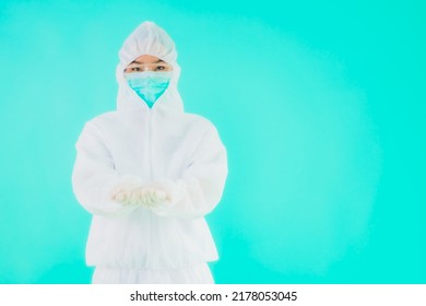 Portrait Beautiful Young Asian Doctor Woman Wear Ppe Or  Personal Protective Equipment For Protect From Coronavirus Or Covid19 On Blue Isolated Background