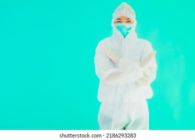 Portrait Beautiful Young Asian Doctor Woman Wear Ppe Or  Personal Protective Equipment For Protect From Coronavirus Or Covid19 On Blue Isolated Background