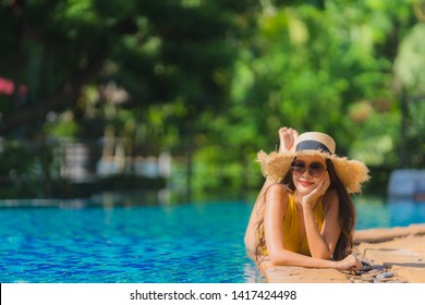 Portrait Beautiful Young Asian Woman Leisure Relax Smile And Happy Around Swimming Pool In Hotel Resort For Holiday Vacation Trip