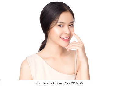 Portrait Beautiful Young Asian Woman Nose Surgery  Concept. Asian Girl Beauty Face Skin Care And Health Wellness, Facial Treatment, Perfect Face Shape, Hand Touching Nose, On White Background.