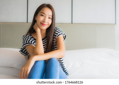 Portrait beautiful young asian woman relax happy smile in bedroom interior - Shutterstock ID 1764668126