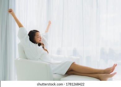 Portrait Beautiful Young Asian Woman Relax Happy Smile With Coffee Cup On Sofa In Living Room Area