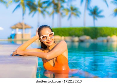 Portrait Beautiful Young Asian Woman Relax Smile Leisure Around Outdoor Swimming Pool With Sea Ocean View