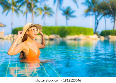 Portrait Beautiful Young Asian Woman Relax Smile Leisure Around Outdoor Swimming Pool With Sea Ocean View