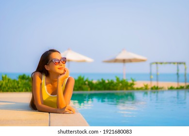 Portrait Beautiful Young Asian Woman Relax Smile Enjoy Leisure Around Swimming Pool In Resort Hotel On Vacation