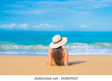 Portrait beautiful young asian woman relax smile leisure around outdoor tropical sea beach ocean in travel vacation - Powered by Shutterstock