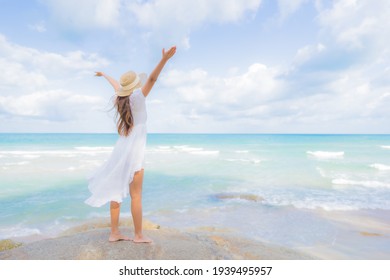 Portrait beautiful young asian woman relax smile leisure around beach sea ocean in travel vacation - Powered by Shutterstock