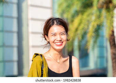 Portrait Of Beautiful Young Asian Woman , Looking To Camera, Headshot, Feeling Happy Smiling, Women Casual Style, Person, Smiling Friendly, Head Shot Candid Portrait, Girl Outdoors, Bangkok, Thailand.