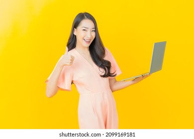 Portrait Beautiful Young Asian Woman Smile With Computer Laptop On Isolated Background