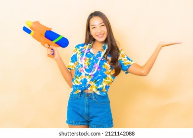 Portrait Beautiful Young Asian Woman Wear Colorful Shirt For Songkran Festival On Color Background