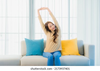 Portrait Beautiful Young Asian Woman Relax Leisure Enjoy On Sofa In Living Room Interior Area