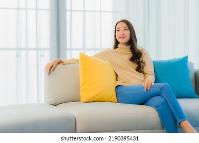 Portrait Beautiful Young Asian Woman Relax Leisure Enjoy On Sofa In Living Room Interior Area