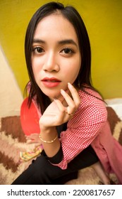 Portrait Of Beautiful Young Asian Woman With Fisheye Lens