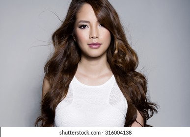 portrait of beautiful young asian woman with clear skin