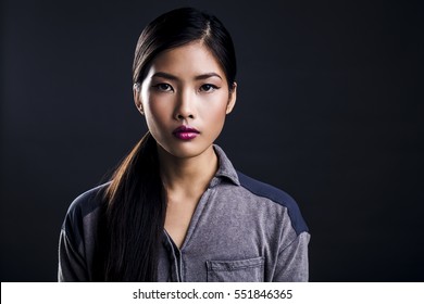 Portrait Of Beautiful Young Asian Woman Being Serious