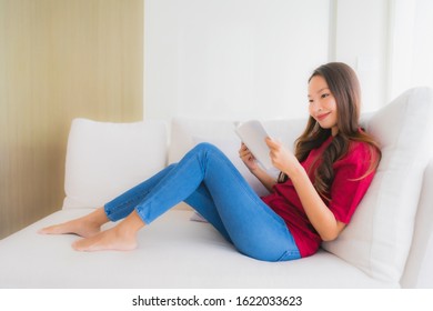 Portrait Beautiful Young Asian Women Read Book On Sofa Chair In Living Room Area