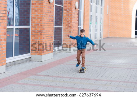 Similar – teenager practicing with skateboard at sunrise city