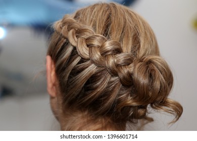 Portrait Of Beautiful Young Blond Woman With Braid Crown Hairstyle.