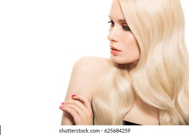 Portrait Of Beautiful Young Blond Woman With Long Wavy Hair. Isolated.
