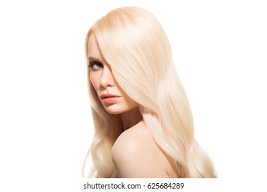 Portrait Of Beautiful Young Blond Woman With Long Wavy Hair. Isolated.