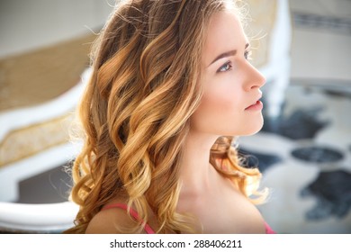 Portrait of a beautiful young bride preparing for wedding in a morning - Shutterstock ID 288406211