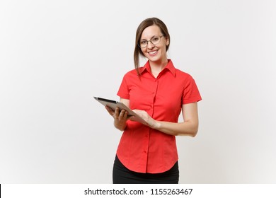 Portrait of beautiful young business teacher woman user in red shirt, glasses working typing on tablet pc computer isolated on white background. Education teaching in high school university concept - Powered by Shutterstock