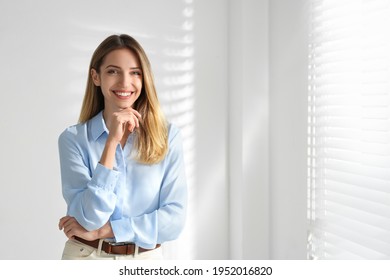 Portrait Of Beautiful Young Businesswoman In Office