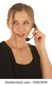 Portrait Of A Beautiful Young Caucasian Businesswoman Wearing Phone Headset On White Background. NOT ISOLATED