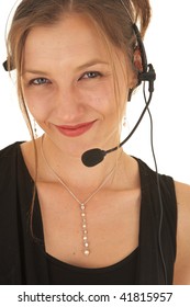 Portrait Of A Beautiful Young Caucasian Businesswoman Wearing Phone Headset On White Background. NOT ISOLATED