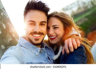 Portrait Of Beautiful Young Couple In Love In The Park.