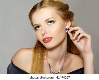  Portrait of beautiful young fashion model with jewelry