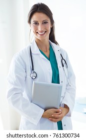 Portrait Of Beautiful Young Female Doctor Looking At Camera In The Office.