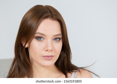Portrait of a beautiful young girl. Face of an eighteen year old woman