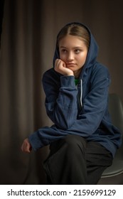 Portrait Of A Beautiful Young Girl In A Home Photo Studio. Artistic Noise.