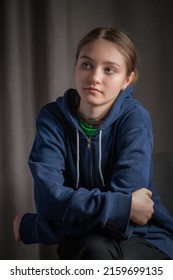 Portrait Of A Beautiful Young Girl In A Home Photo Studio. Artistic Noise.