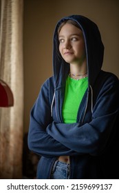 Portrait Of A Beautiful Young Girl In A Home Photo Studio. Artistic Noise.