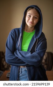 Portrait Of A Beautiful Young Girl In A Home Photo Studio. Artistic Noise.