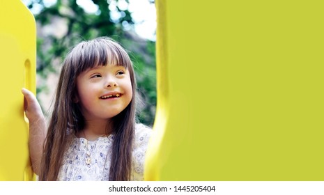 Portrait of beautiful young girl on the playground. - Shutterstock ID 1445205404