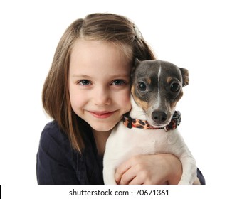 Portrait Of A Beautiful Young Girl Snuggling With A Cute Terrier Puppy Dog, Isolated On White In Studio