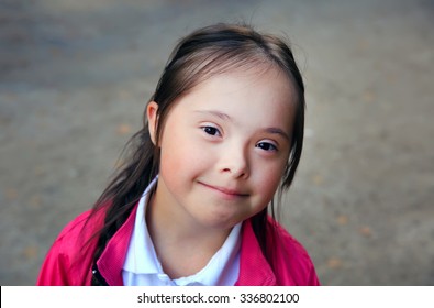 Portrait of beautiful young happy girl