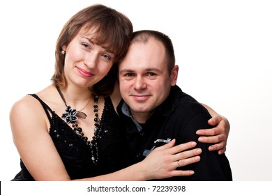 Portrait of a beautiful young happy smiling couple isolated on white
