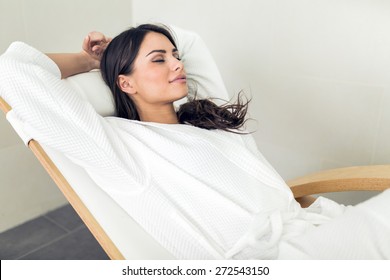 Portrait Of A Beautiful Young  Healthy Woman Relaxing In A Robe