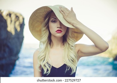 Portrait Of A Beautiful Young Lady In A Straw Hat