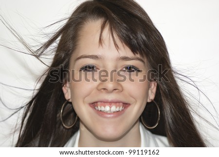 Portrait of beautiful young laughing girl