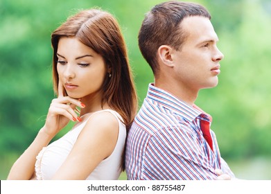 Portrait Beautiful Young Man Woman Couple Standing Back Each Other Sad Background Summer Green Park