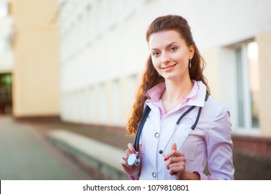 Portrait of a beautiful young medical student girl.