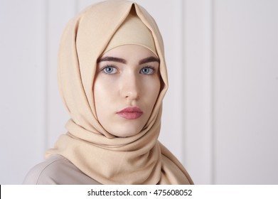 portrait of a beautiful young Muslim woman wearing a hijab on her head
