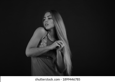 Portrait of beautiful young woman in black and white