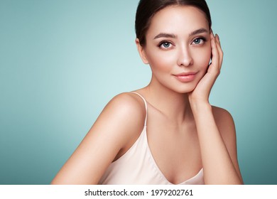 Portrait beautiful young woman with clean fresh skin. Model with healthy skin, close up portrait. Cosmetology, beauty and spa - Shutterstock ID 1979202761