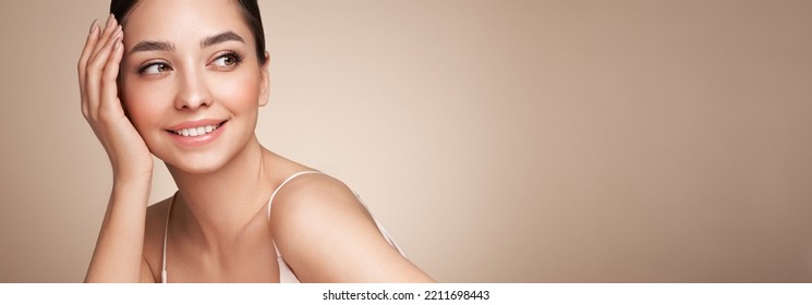 Portrait beautiful young woman with clean fresh skin. Model with healthy skin, close up portrait. Cosmetology, beauty and spa - Shutterstock ID 2211698443